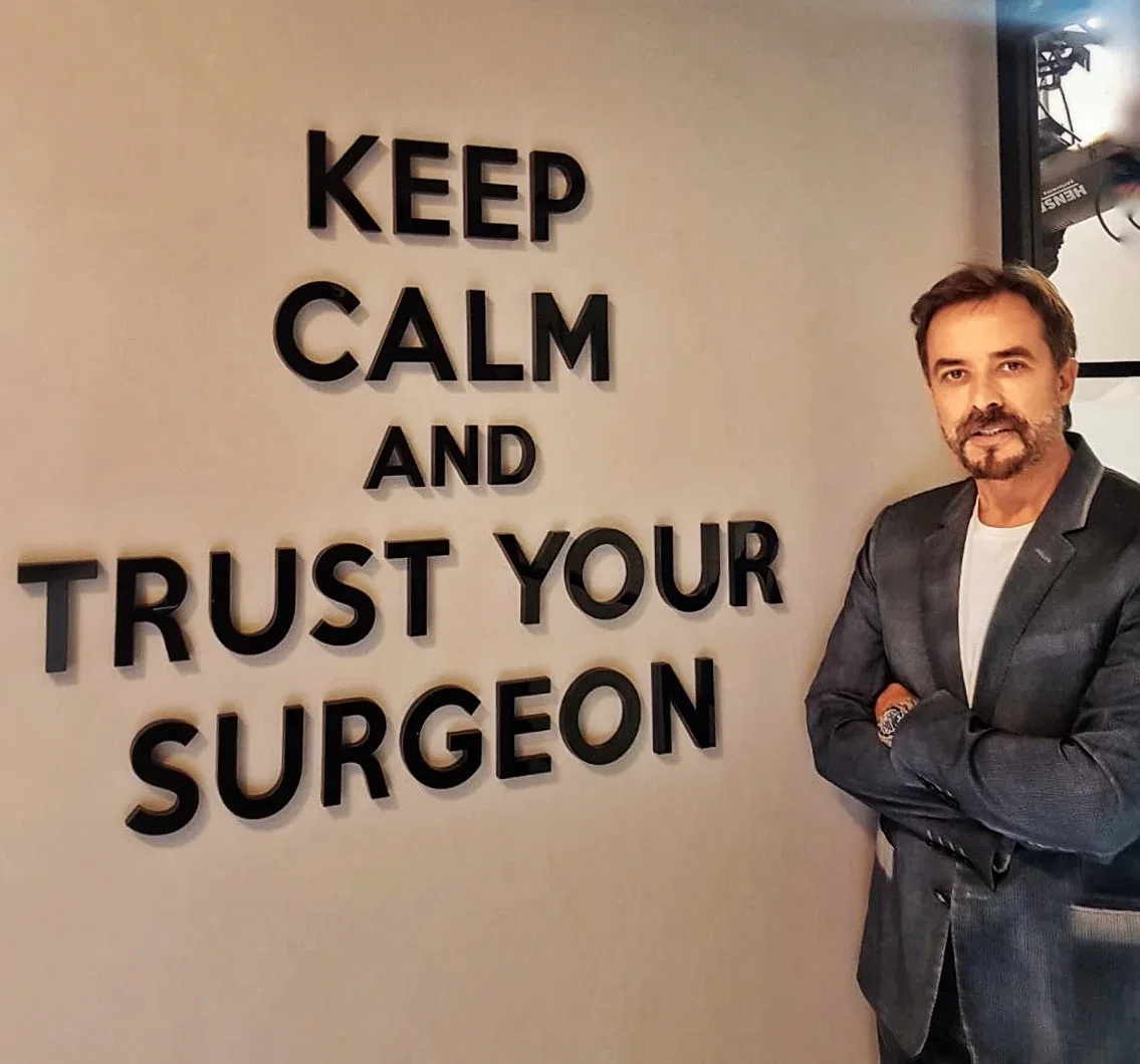 A patient in consultation with a board-certified aesthetic surgeon